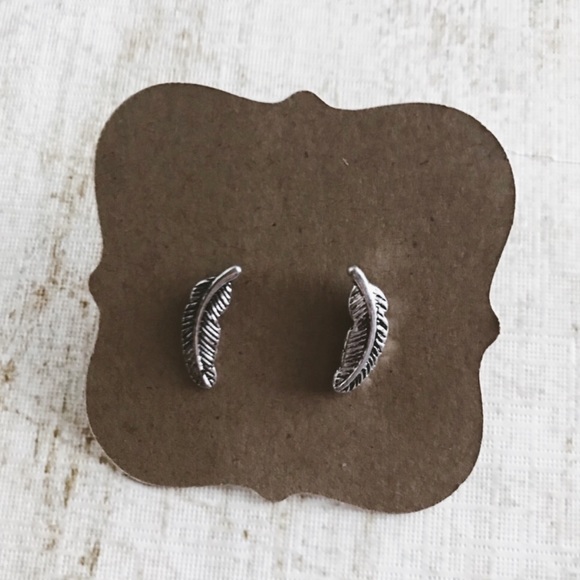 Jewelry - tiny silver feather earring studs